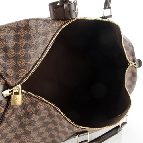 Bolsa de viagem, modelo Louis Vuitton, medindo 60x30cm